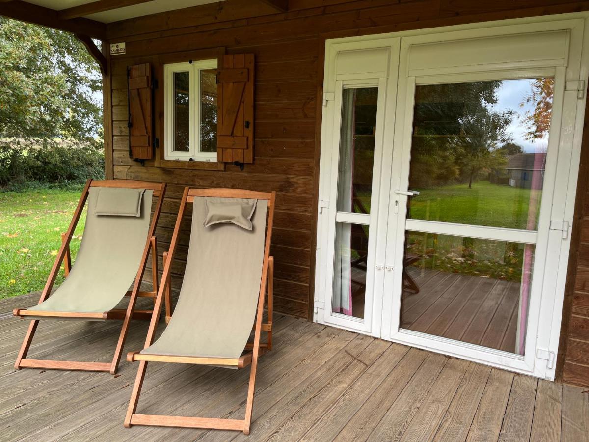 Les Maisonnettes Du Lac - Base De Loisirs Lavare Exterior foto